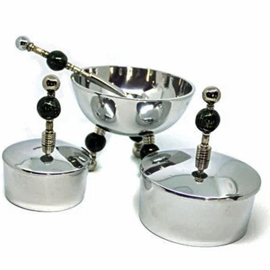 The Stainless Steel Dip Bowl Set – Green Ceramic Legs & Trinket Boxes includes two lidded trinket boxes and a round bowl on green ceramic legs, each with bead-like handles and a matching spoon.