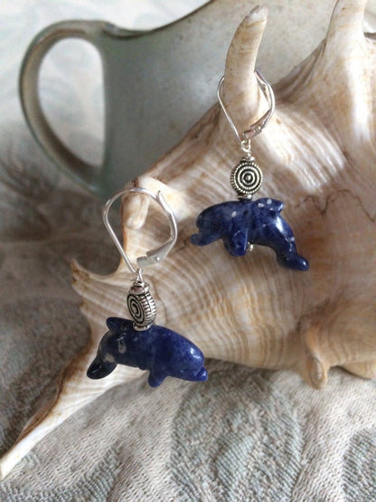 Dolphin Earrings in blue sodalite - showcasing vibrant blue color and silver lever backs, ideal for sea life enthusiasts.